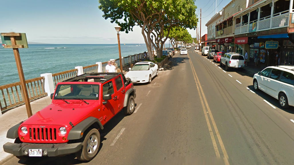 Red Jeep parked on Main Street Lahaina